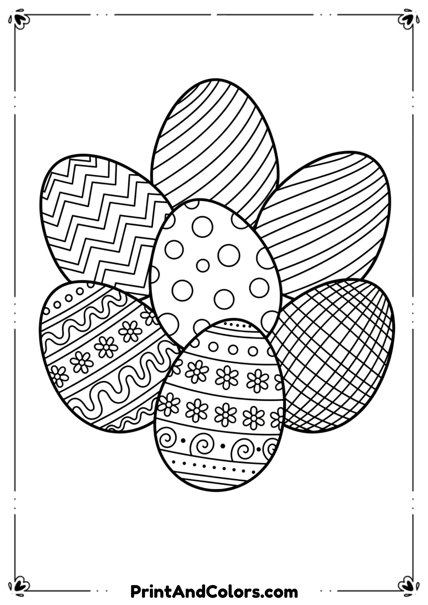 Black and white Easter eggs decorated with chevron lines, stripes, and polka dots.
